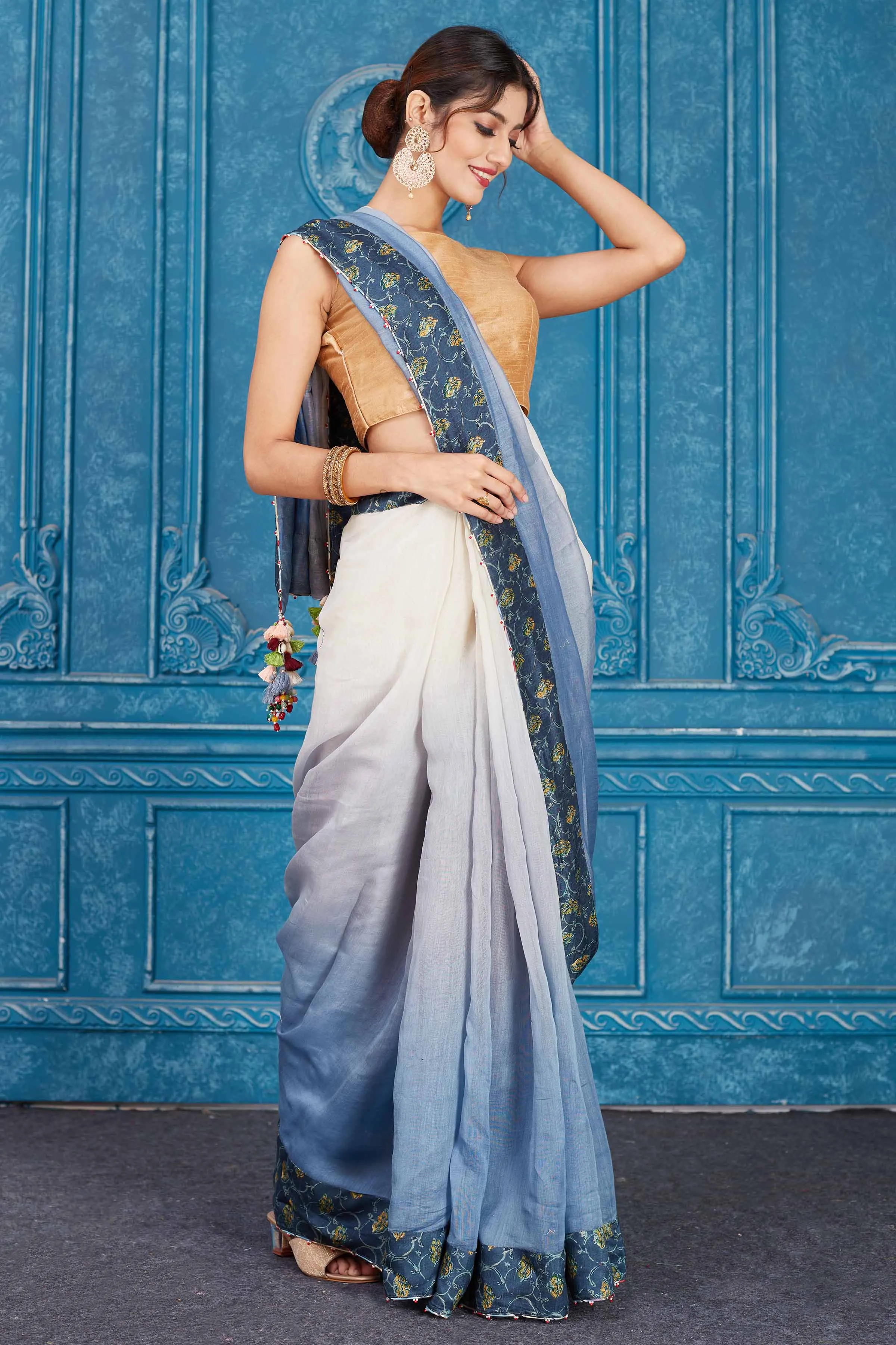 91A349 Ombre Blue Linen Saree with Floral Border